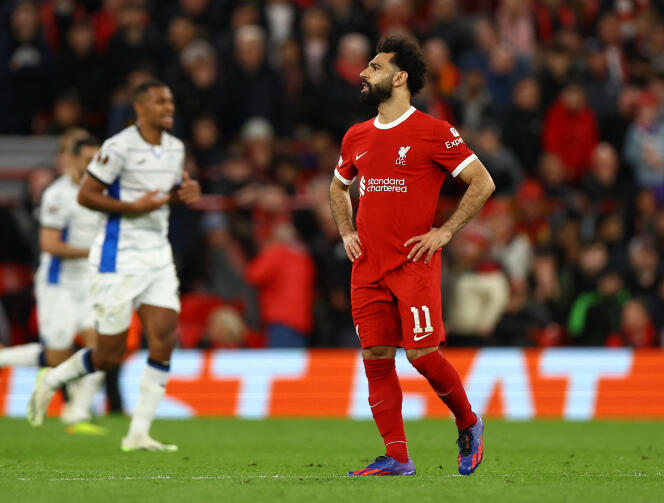 Liverpool's Mohamed Salah looks dejected after Atalanta's Mario Pasalic scores their third goal.