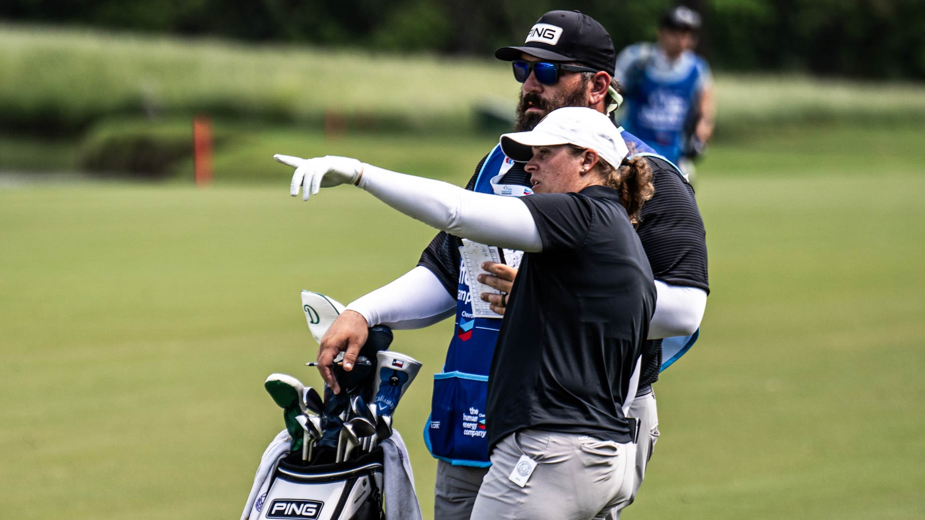 Her husband quit his job to caddie for her. Now she's leading a major 2 Lauren Coughlin talks with her caddie at the Chevron Championship.