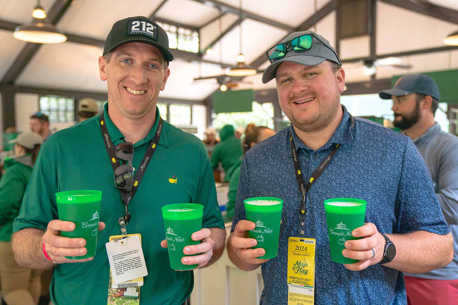 patrons hold the crow's nest beer at augusta national