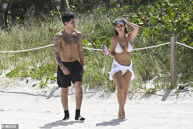 Garcia was decked out in shorts and socks while Boor wore a revealing white bikini