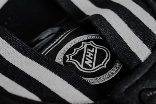 Are the Winnipeg Jets or the Washington Capitals More Likely to Lift the Stanley Cup? 1 Screenshot 2025 01 09 at 16 26 56 A black and white striped shirt with a badge on it photo – Free Gr